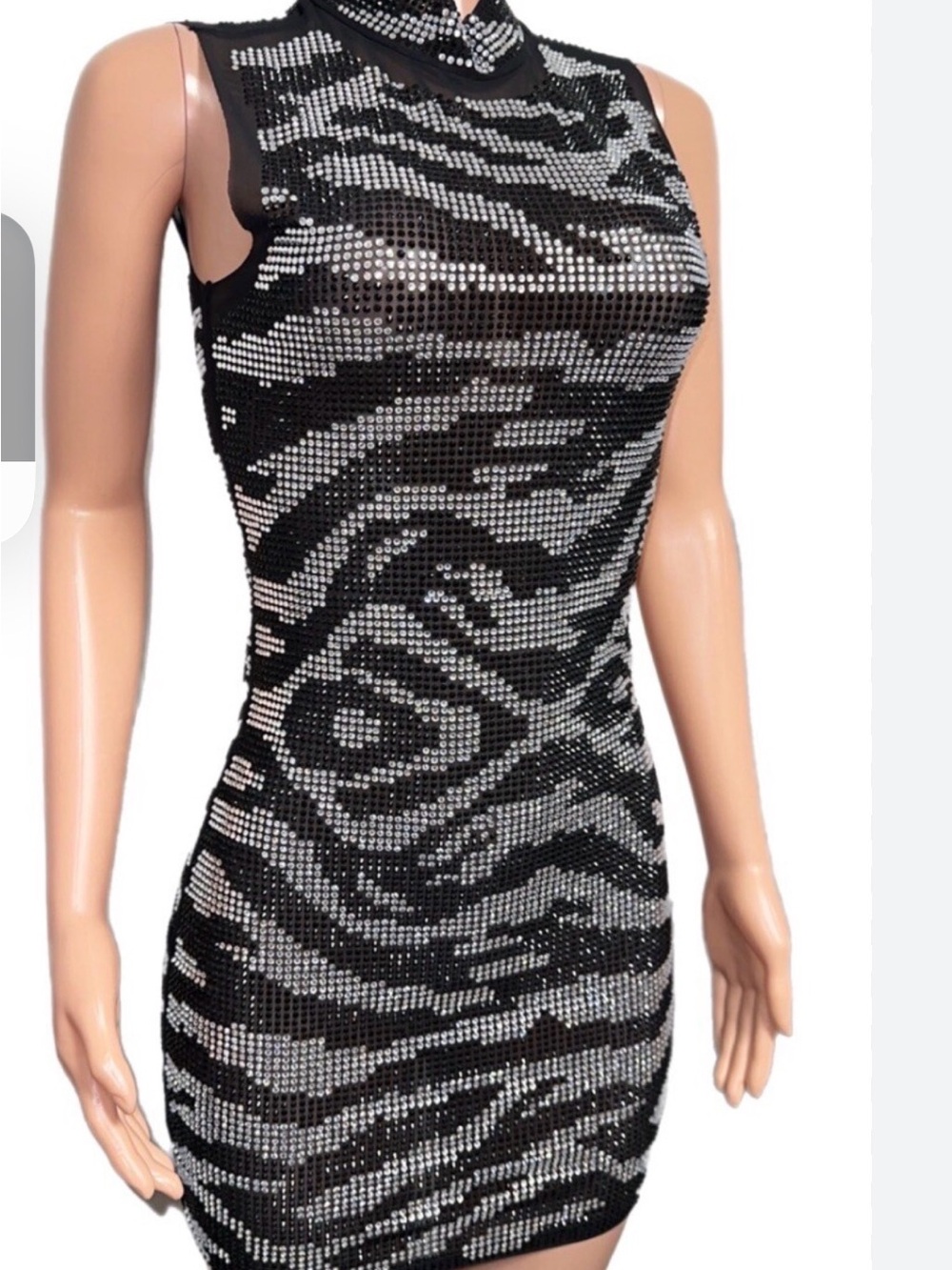 AKIRA Black and White rhinestone  Zebra 
Short but not mini length Dress